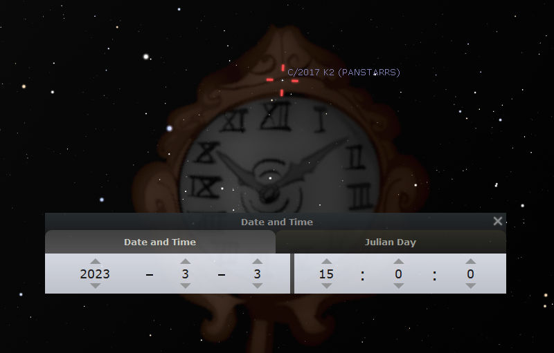 An image of an ornate clock displaying Roman numerals against a night sky filled with stars. A bright red marker on the clock points to "C/2017 K2 (PANSTARRS)", and a software interface shows the date and time as March 3, 2023, 15:00:00 with the Julian Day calculation.