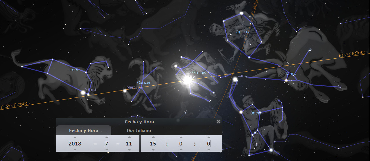 Imagen digital del cielo nocturno que exhibe constelaciones con sus dibujos correspondientes y nombres escritos en español, como León y Géminis. Se observan también cuerpos celestes como la Luna y Venus, conectados por líneas que simbolizan sus trayectorias relative al eclíptico. En la parte inferior se muestra información detallada sobre la fecha y hora.