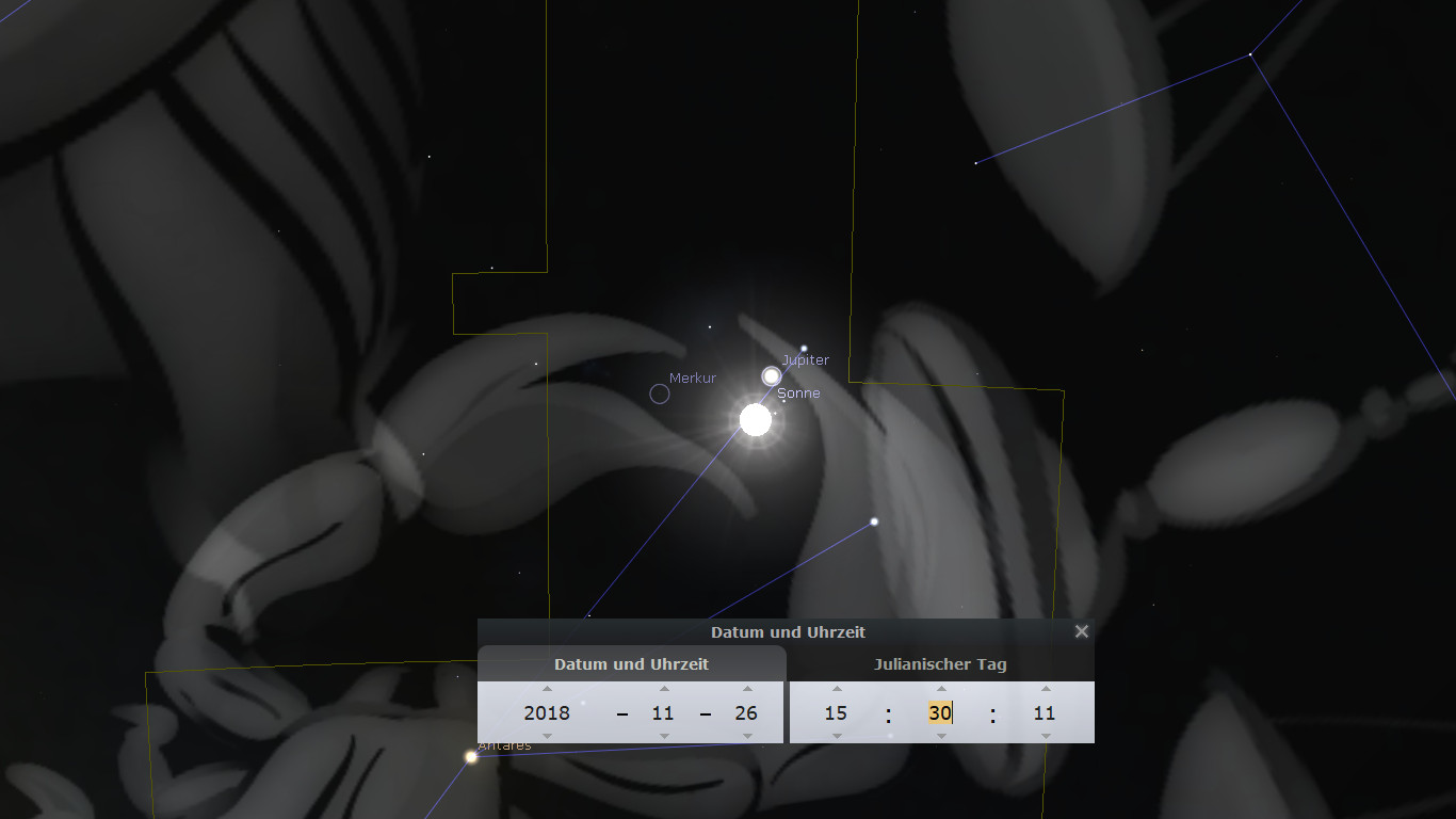 Eine astronomische Grafik, die eine Konstellation der Mazzaroth zeigt, mit der Sonne, Merkur und Jupiter, die durch Linien verbunden sind. Die Grafik enthält Datums- und Zeitangaben im Vordergrund, die auf den 26. November 2018 hinweisen, dargestellt auf einem monochromen Hintergrund mit abstrakten floralen Mustern.